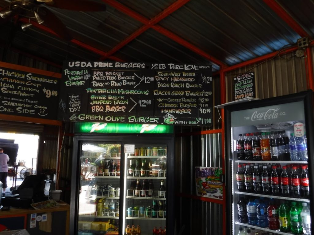 menu and drink coolers inside Meaty's